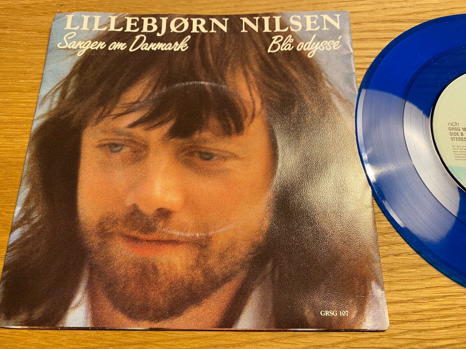 LILLEBJØRN NILSEN SANGEN ON DANMARK/BLÅ ODYSSÈ 1985 NORWEGIAN 7" SINGLE BLUE WAX