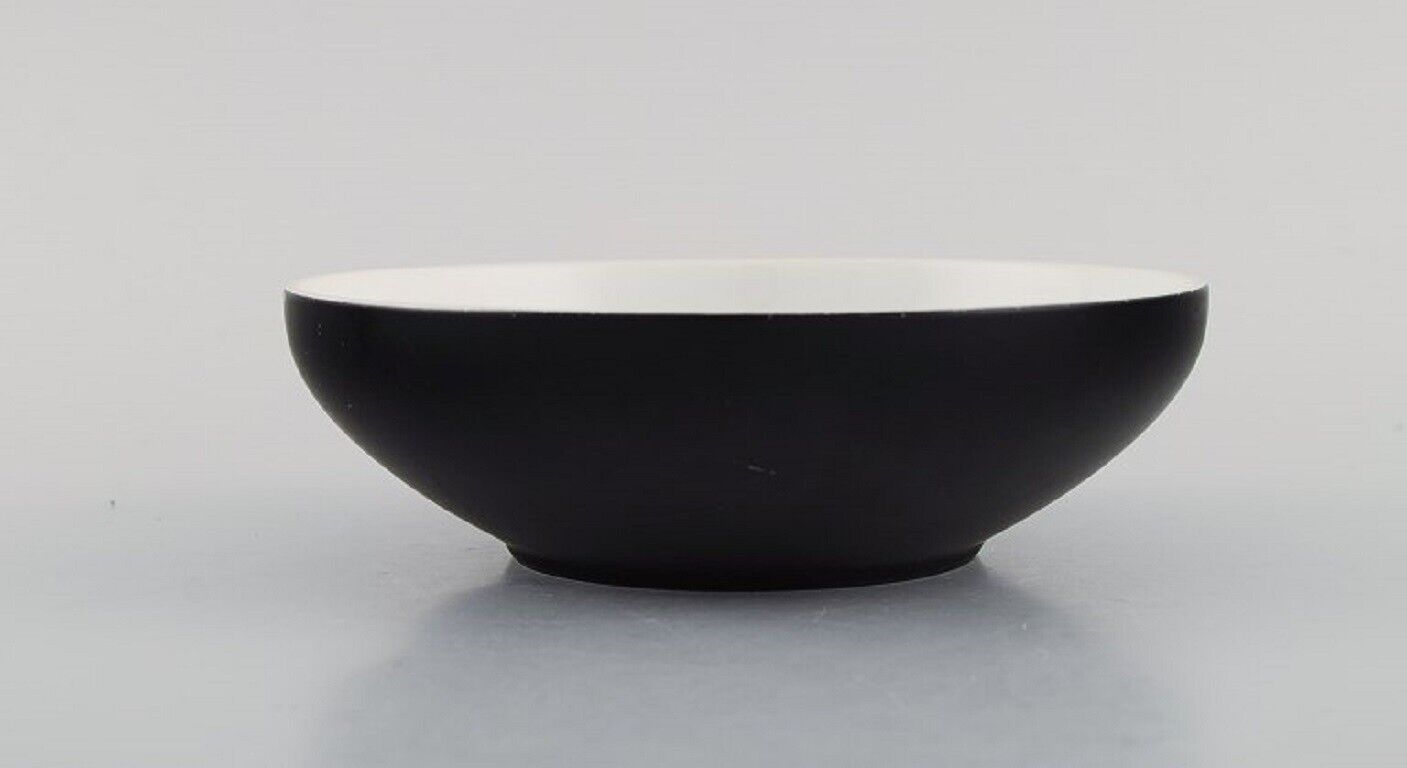 Kenji Fujita for Tackett Associates Four bowls in porcelain Dated 1953-56