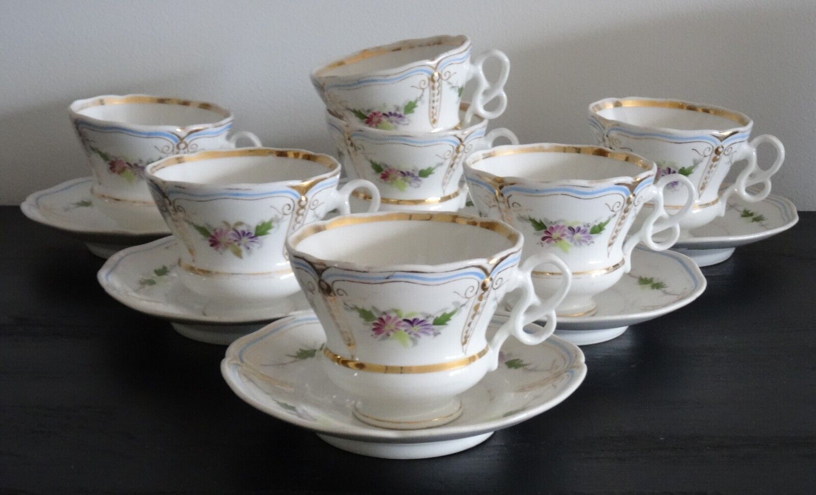 A LOT OF ANTIQUE CARL TIELSCH CUPS AND SAUCERS