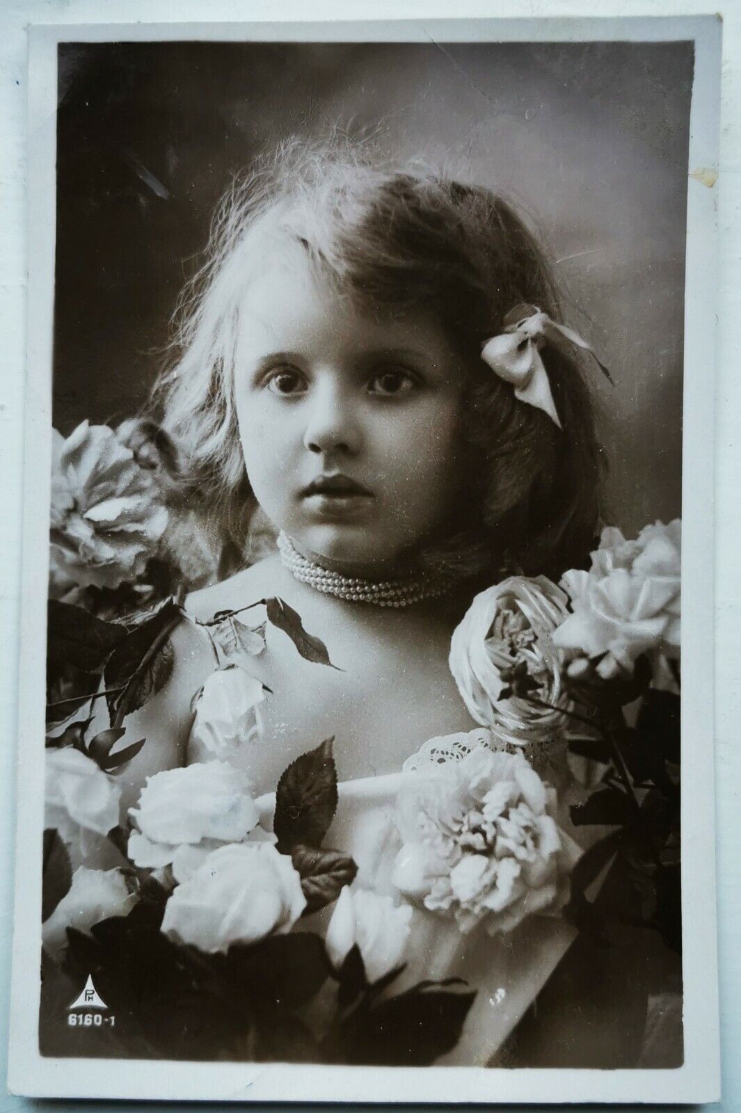 Old photo postcard: Cute young girl decorated with flower Mailed 1911  pok1392