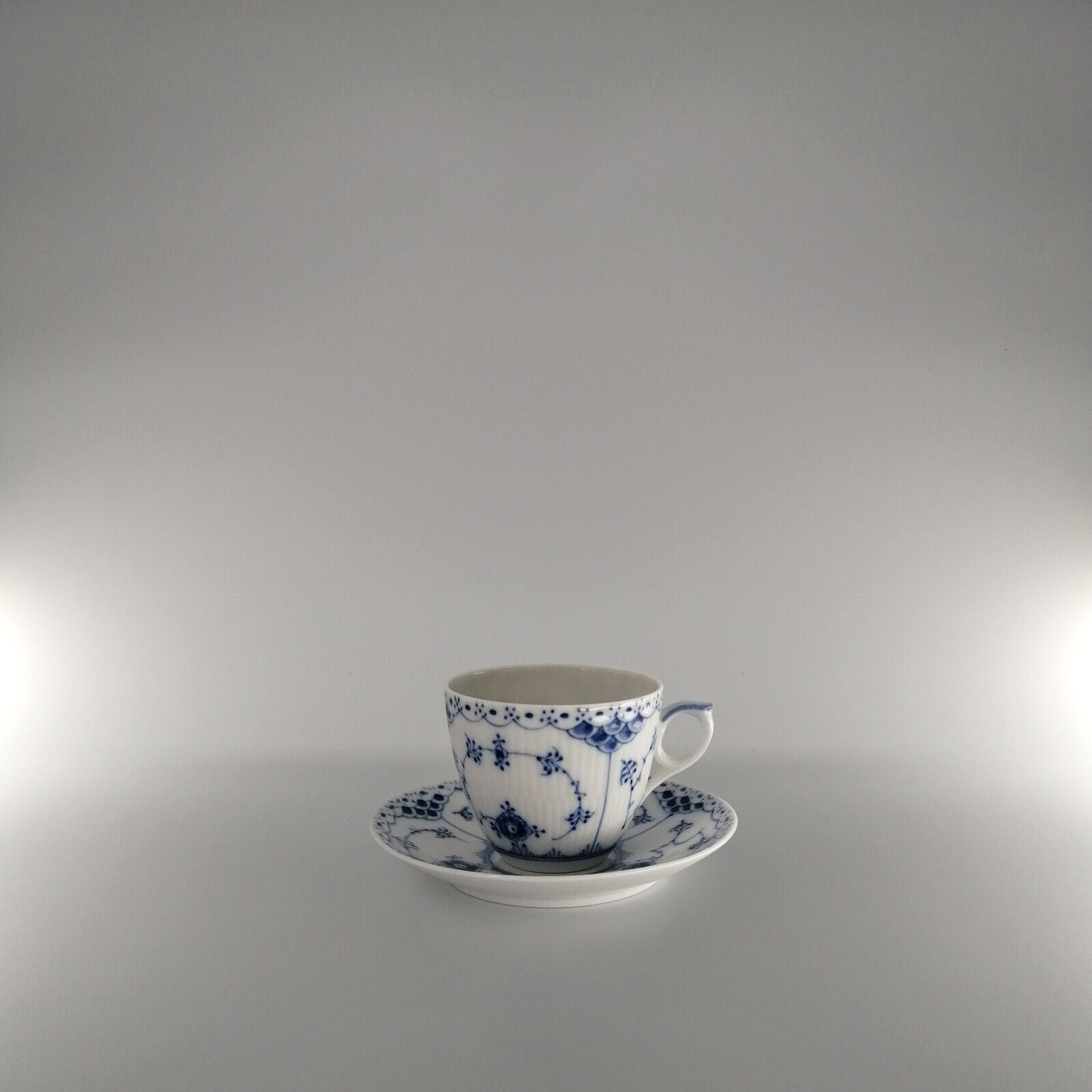 Royal Copenhagen Blue Fluted Half Lace Cup with Saucer (17 cl) - #072/073