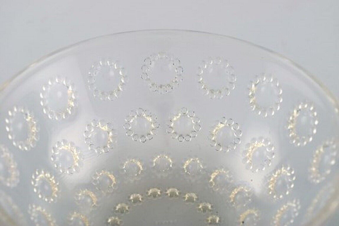 Three early René Lalique "Asters" bowls in art glass Dated before 1945