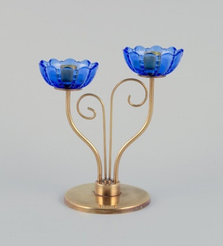 Gunnar Ander for Ystad Metall Brass candlestick holder with blue glass sleeves