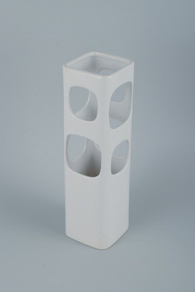 European studio ceramicist Unique vase with holes in white glaze