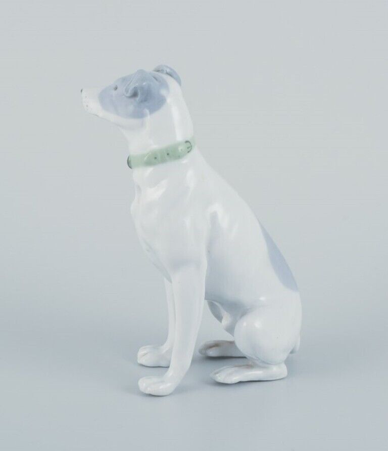 Fritz and Ilse Pfeffer Gotha Germany Porcelain figurine of a sitting dog