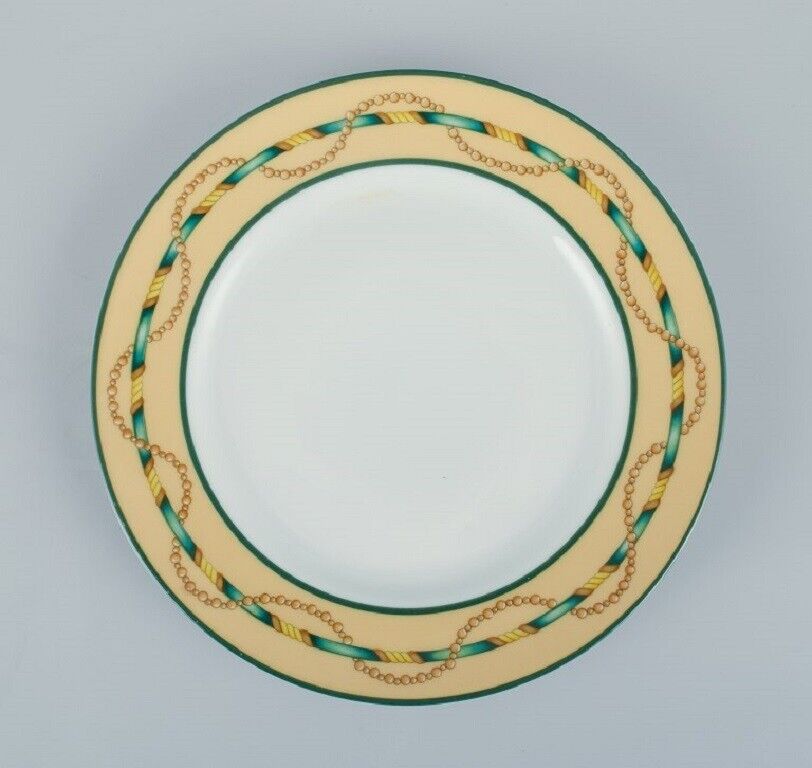 Giacomo Passera for Porcelaine de Paris A set of four plates