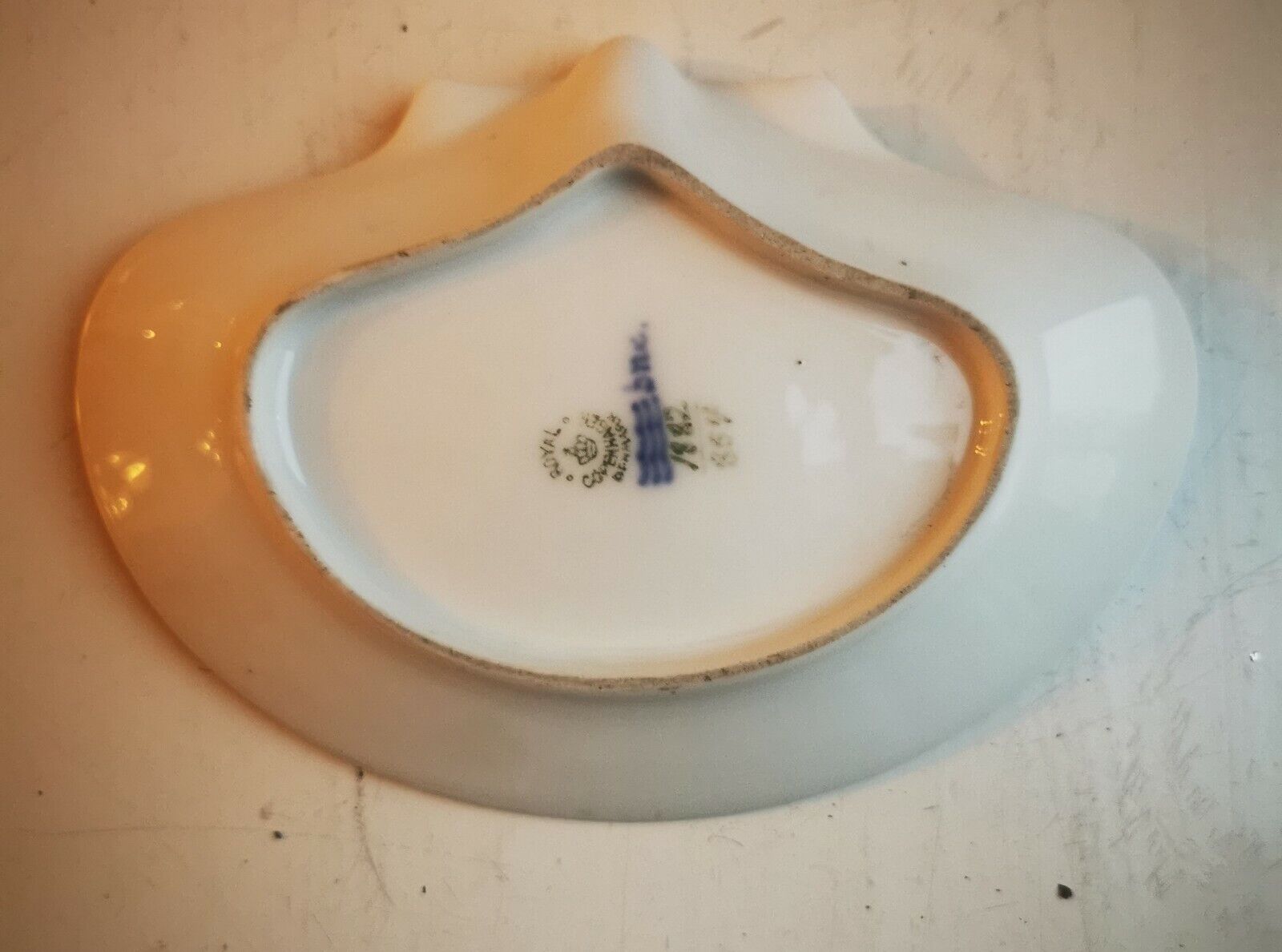 Old Royal Copenhagen porcelain dish in organic shape with boad sea motif 1930s