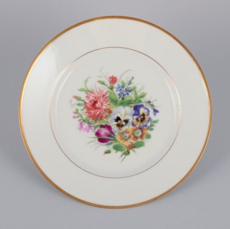 Bing  Grøndahl Denmark Set of five porcelain plates hand-painted with flowers