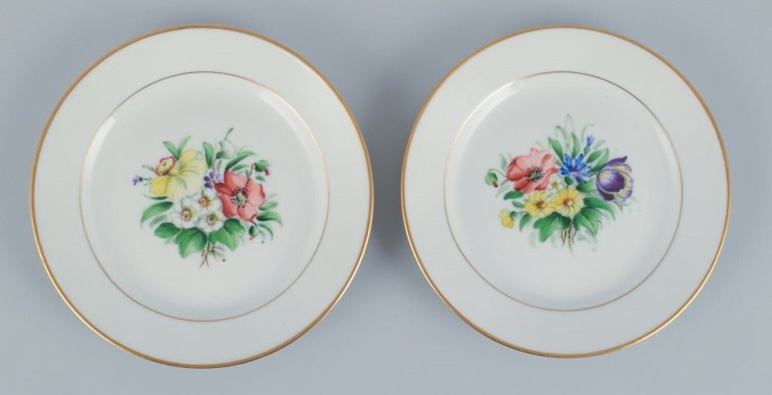 Bing  Grondahl set of fourteen plates in porcelain with flowers