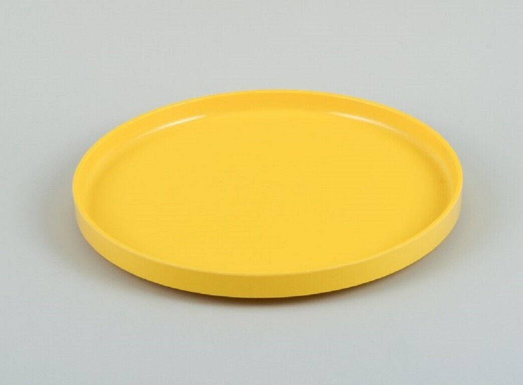 Massimo Vignelli for Heller Italy A set of 4 dinner plates in yellow melamine