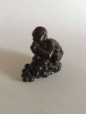 Bing and Grondahl Stoneware figurine Boy with grapes by Kai Nielsen