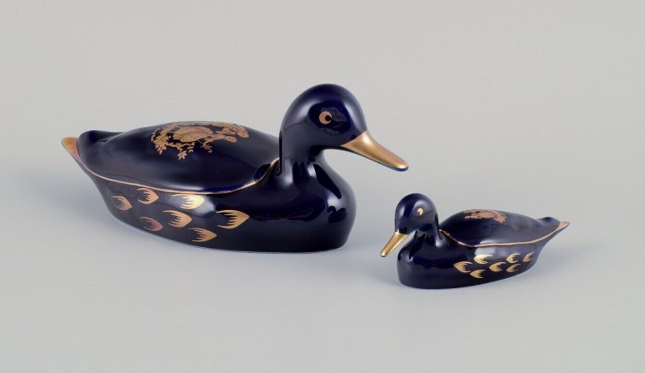 Limoges France Two porcelain ducks decorated with 22-karat gold leaf