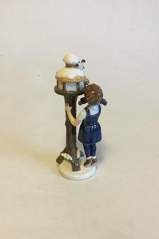 Royal Copenhagen Figurine of Girl by Bird Feeder No 757