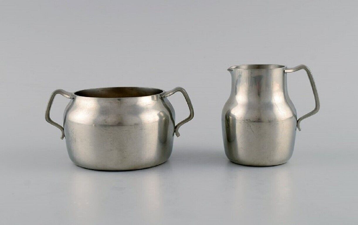 Just Andersen (1884-1943) Denmark Art Deco pewter creamer and three bowls