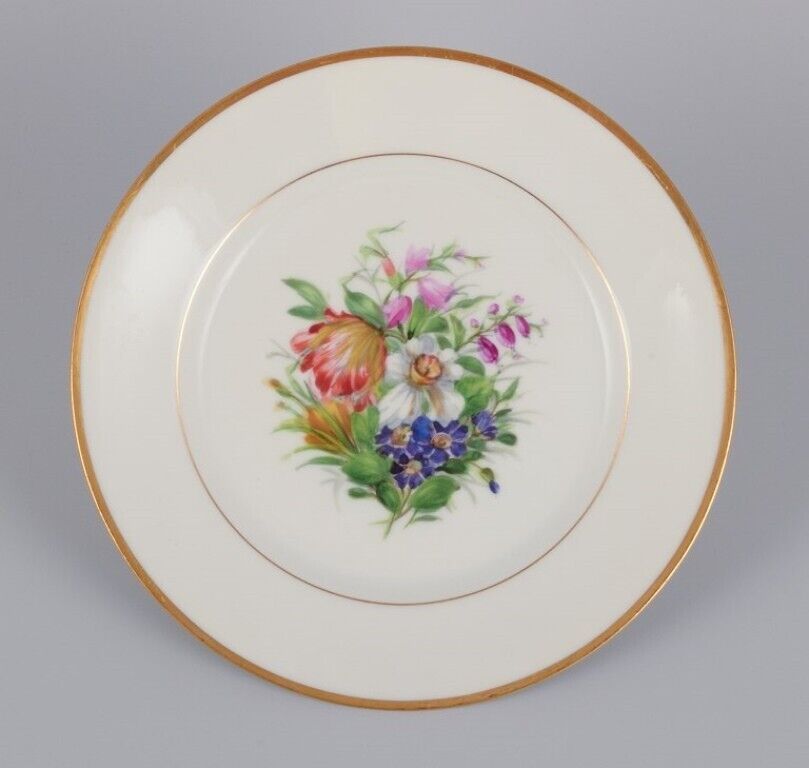 Bing  Grøndahl Denmark Set of five porcelain plates hand-painted with flowers