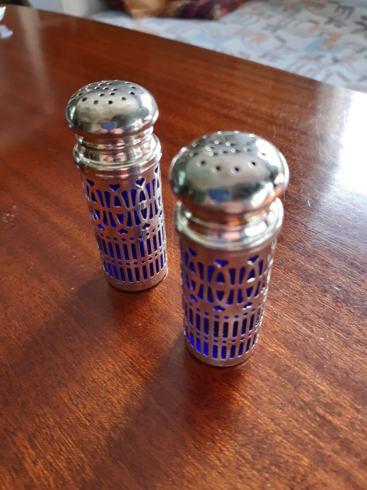 Salt and pepper metal and cobalt blue glass shaker