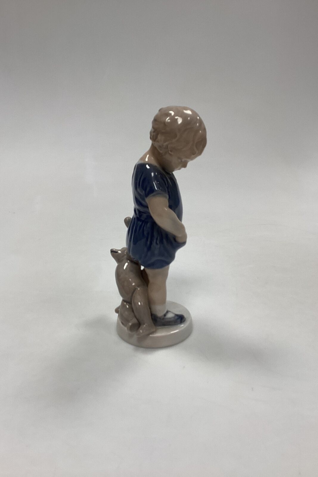 Royal Copenhagen Figurine of Boy with Teddy Bear No 3468