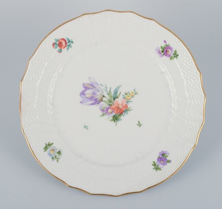 Royal Copenhagen four Saxon Flower dinner plates in porcelain