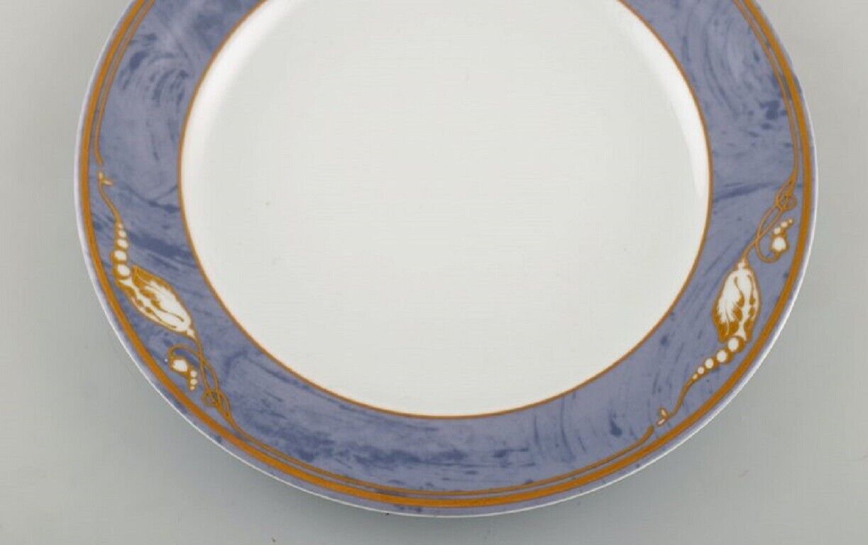 Eight Royal Copenhagen Gray Magnolia porcelain dinner plates Late 20th C