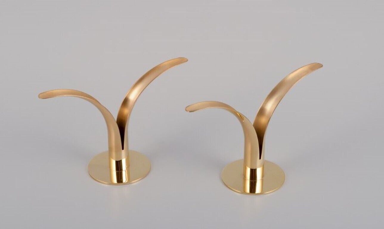 Ivar Ålenius Björk Pair of "Liljan" candle holders in brass Skultuna Sweden