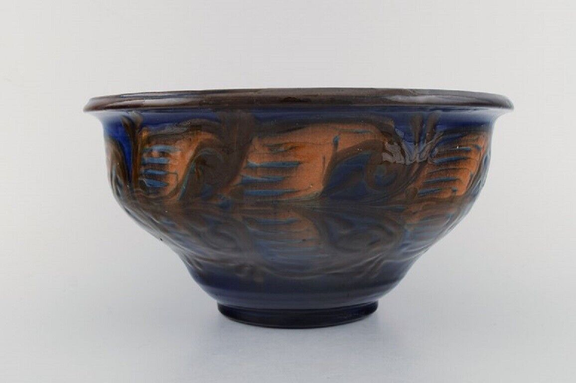 Kähler Denmark Bowl in glazed stoneware Orange foliage on blue background