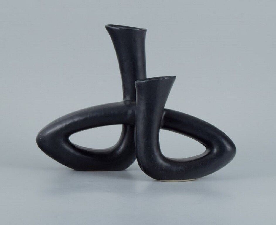 European studio ceramicist Unique twisted vase in black glaze