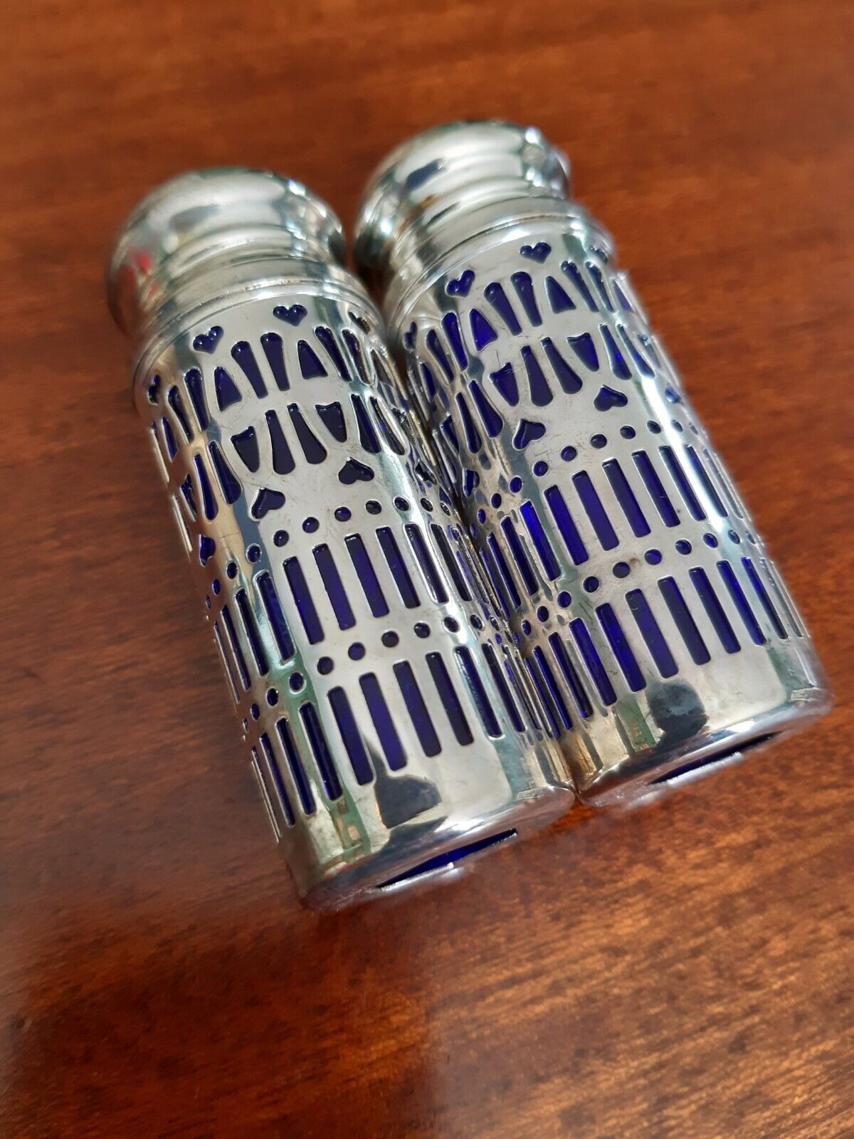 Salt and pepper metal and cobalt blue glass shaker