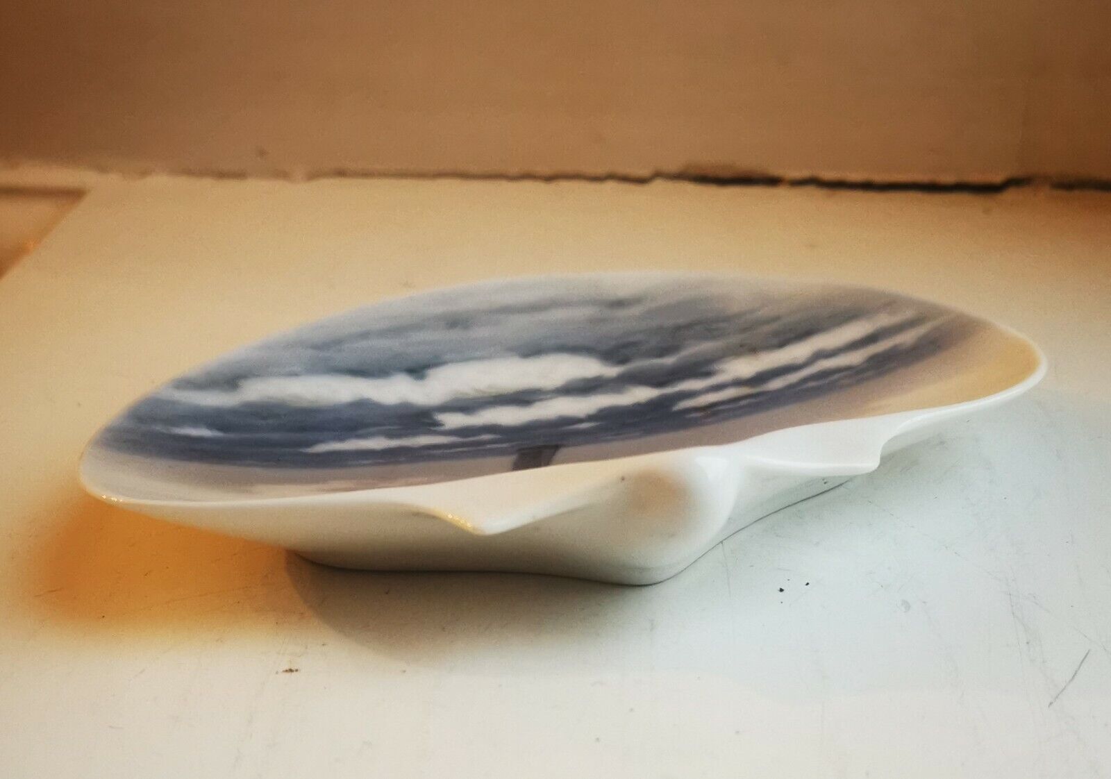 Old Royal Copenhagen porcelain dish in organic shape with boad sea motif 1930s