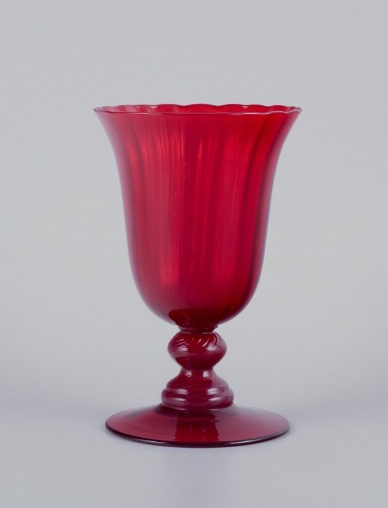A set of six large wine glasses in red glass Sweden Late 20th century