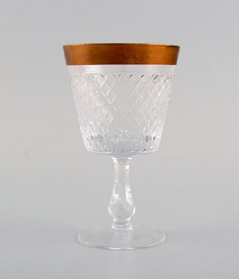 Four wine glasses in mouth-blown crystal glass with gold edge France 1930s