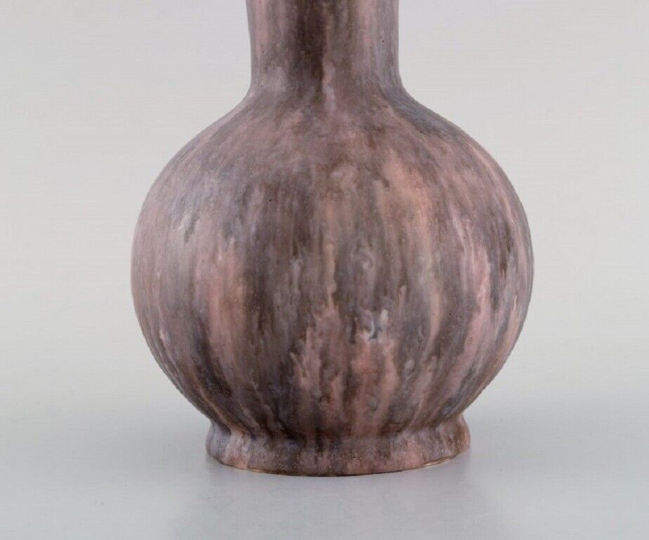 Antique Zsolnay vase in glazed ceramisc with pink undertones App 1910