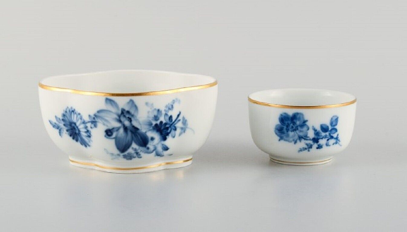 Meissen two bowls hand-painted with blue flowers and gold rim Late 19th C