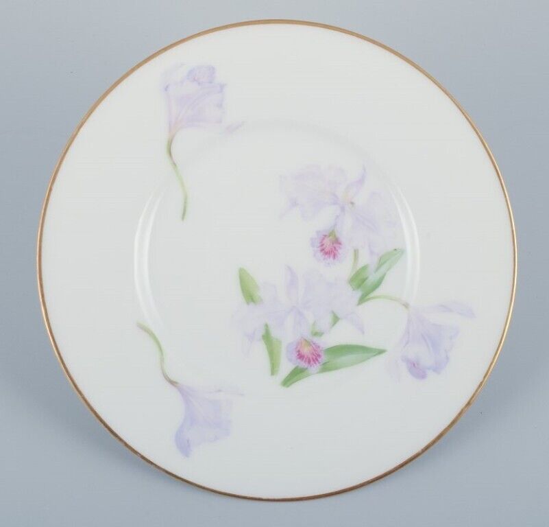 Royal Copenhagen five porcelain Art Nouveau plates with lilies and gold trim