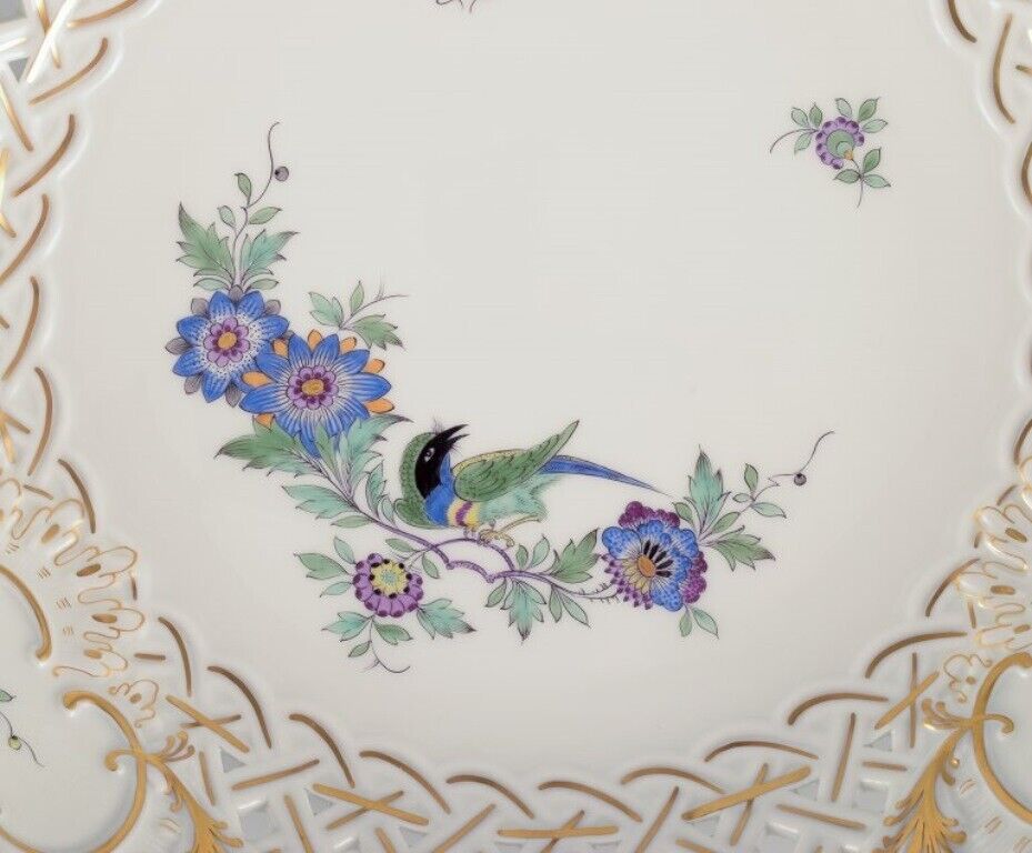 Meissen Germany Open lace bowl in porcelain decorated with an exotic bird