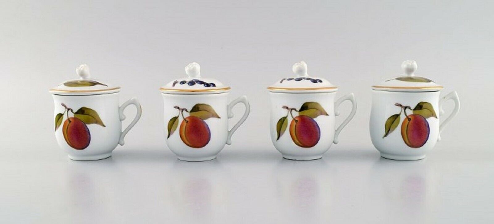 Royal Worcester England Four Evesham porcelain cream cups with fruits