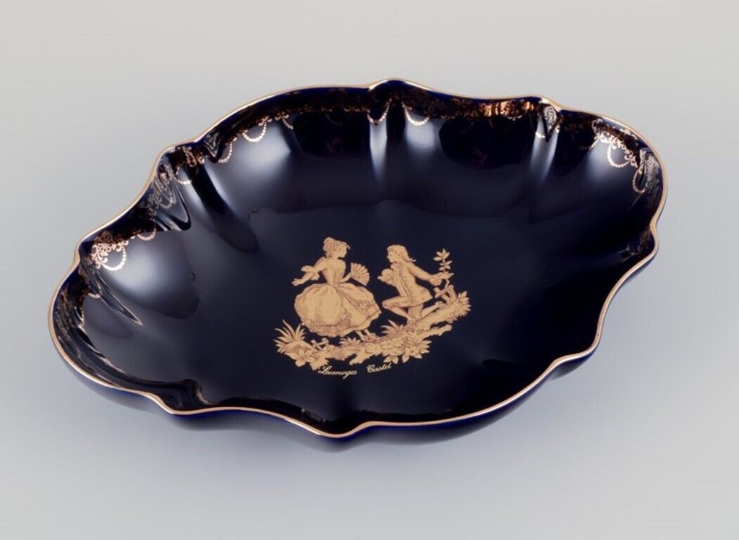 Limoges France Two porcelain serving platters adorned with 22-karat gold leaf