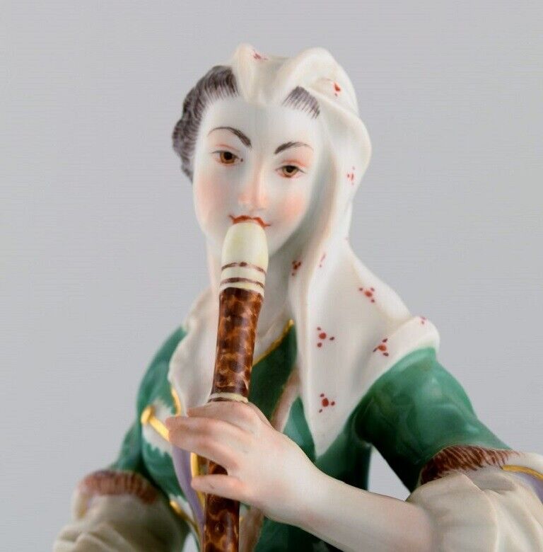 Antique Meissen porcelain figurine Woman playing flute Late 19th century