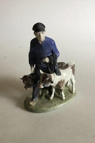 Royal Copenhagen Figurine Boy with Calfs No 1858