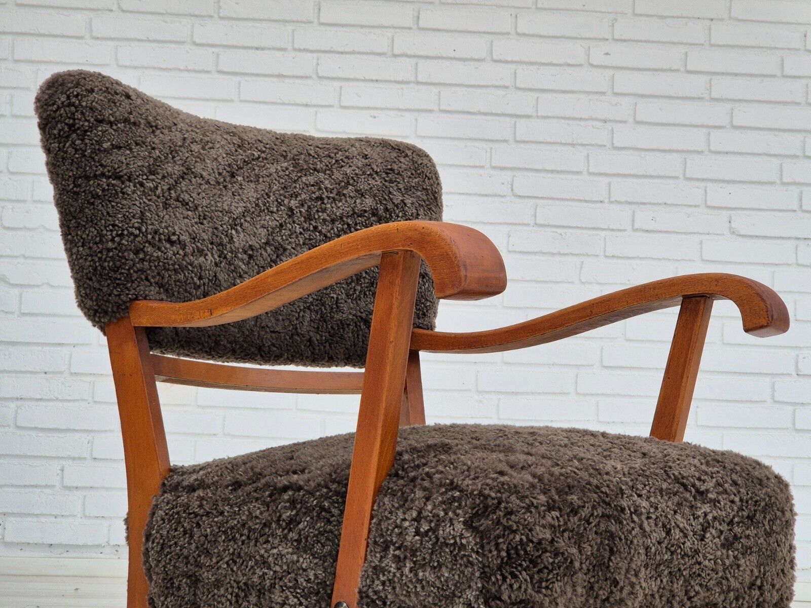 1950s Danish design reupholstered armchair New Zealand sheepskin oak wood