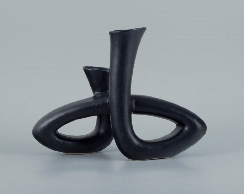 European studio ceramicist Unique twisted vase in black glaze