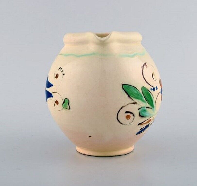 Kähler HAK Jug in glazed stoneware Flowers on a cream colored background