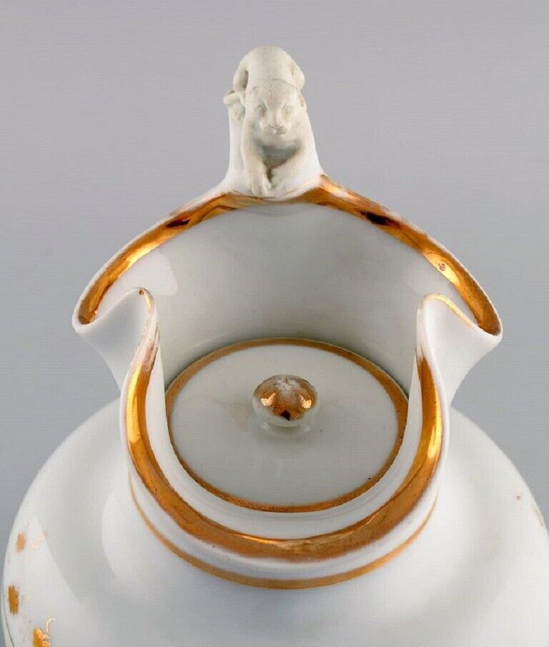 Antique Bing  Grøndahl chocolate jug in porcelain with a lion on a handle