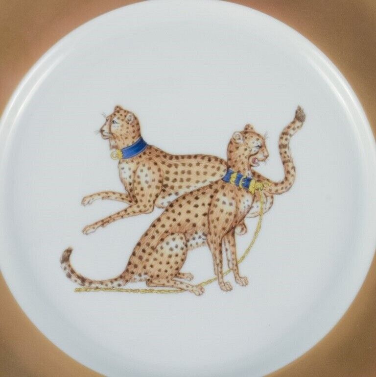 Porcelaine de Paris (Décor - Chasses Royales) Two cover plates with cheetahs