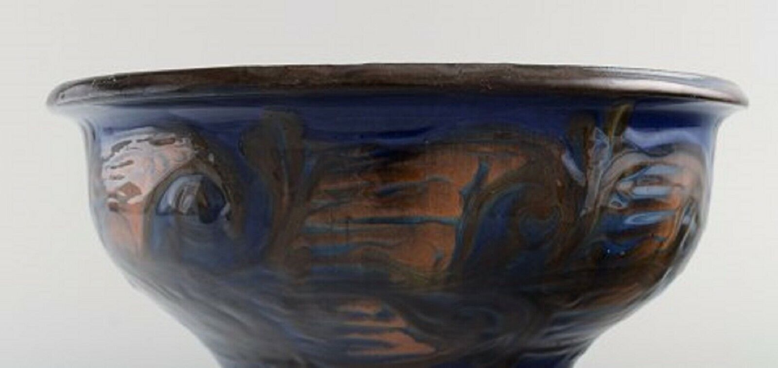 Kähler Denmark Bowl in glazed stoneware Orange foliage on blue background