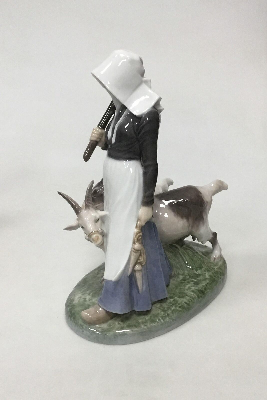 Royal Copenhagen Figurine of Woman with goats No 694