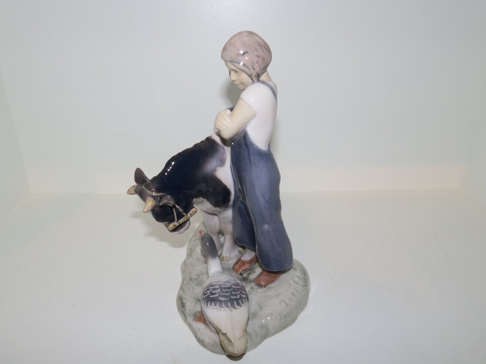 Rare Bing  Grondahl figurine farmgirl with cow and goose