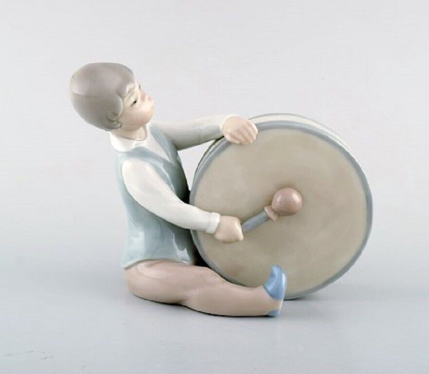 Lladro Spain Four porcelain figurines Children with instruments 1980's