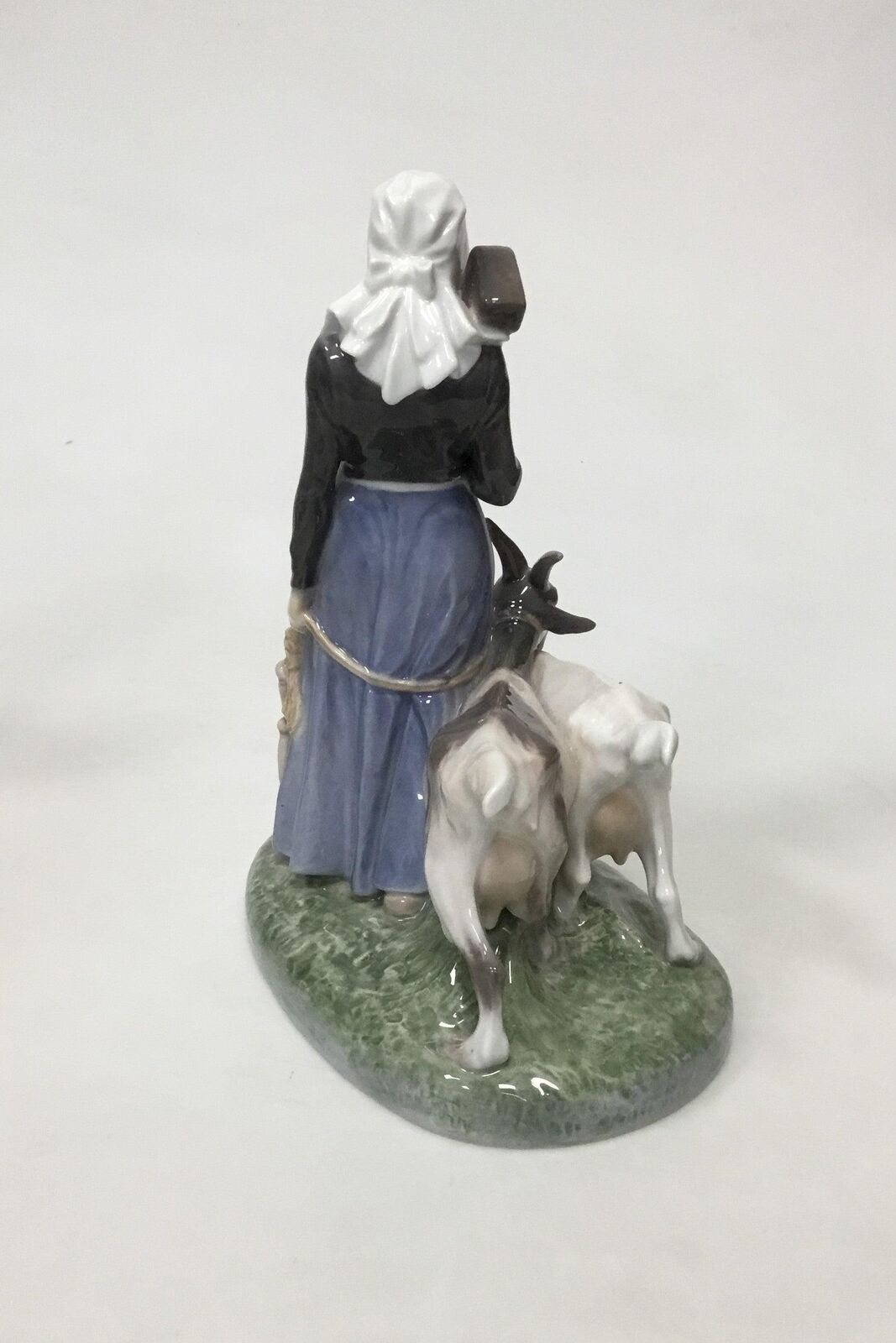 Royal Copenhagen Figurine of Woman with goats No 694