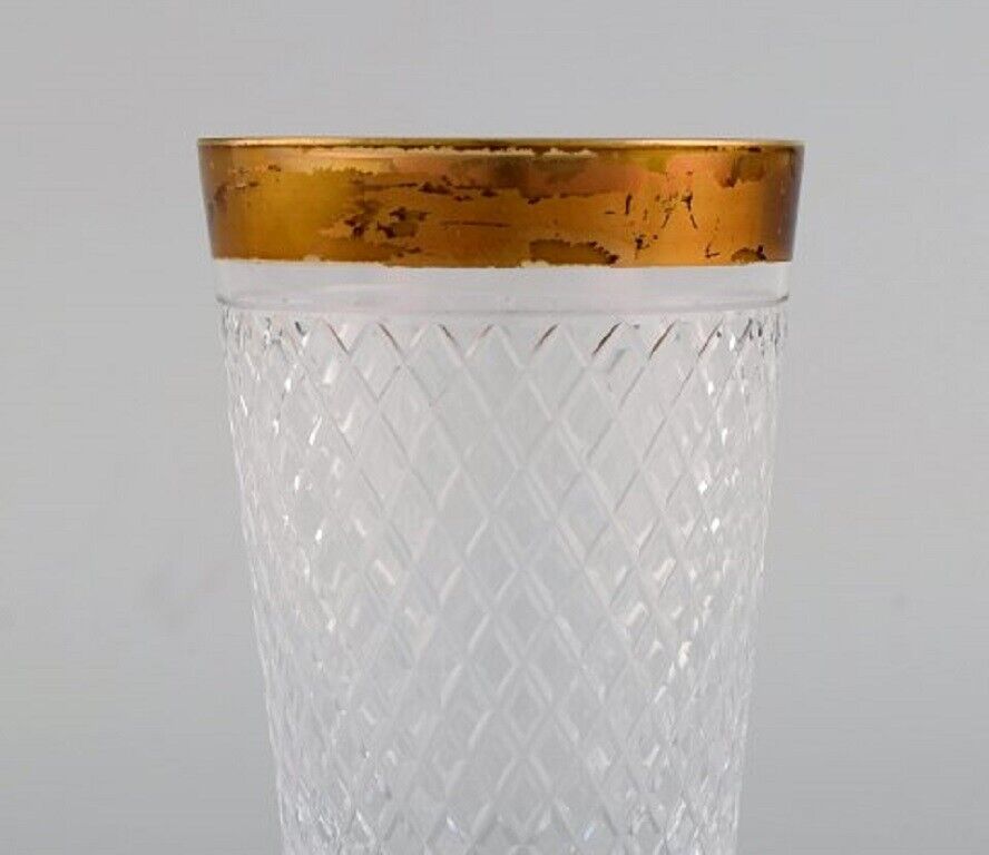 Seven drinking glasses in mouth-blown crystal glass with gold edge France 1930s