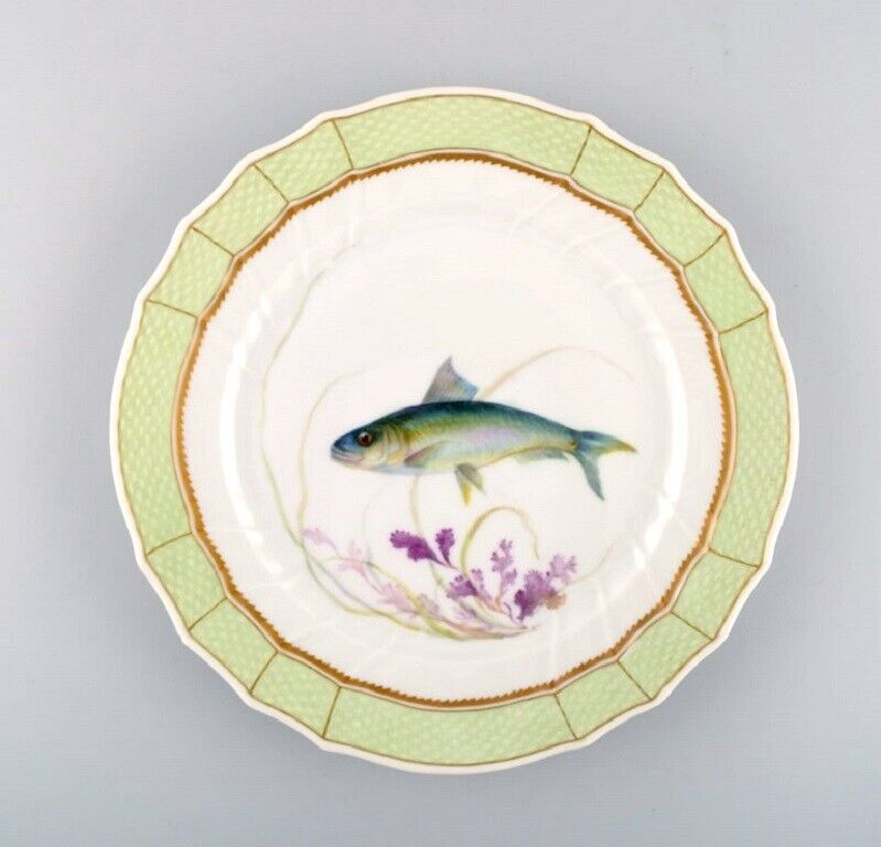 Royal Copenhagen fish plate with green edge gold decoration and fish motif